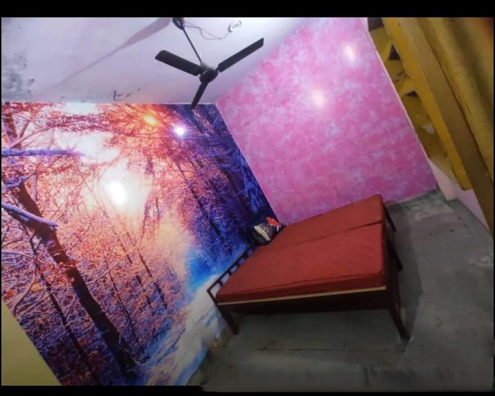 Furnished single room at Bala Ji PG with bed, cupboard and desk