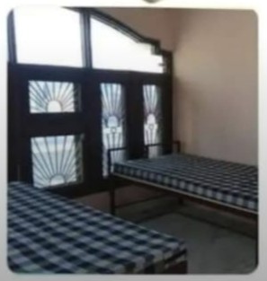 Spacious shared room with 2 beds at Bala Ji PG near IIT Roorkee